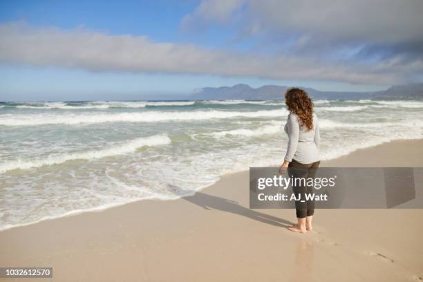 life, like the ocean is beautiful - wavy brown hair stock pictures, royalty-free photos & images