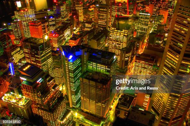 view of sydney central business district at night - centrepoint tower stockfoto's en -beelden