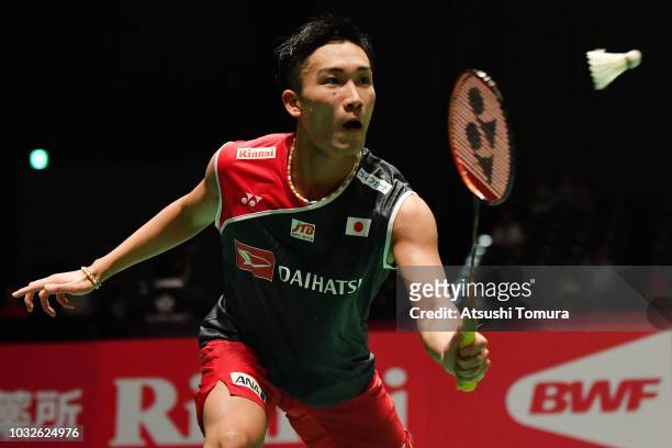 Kento Momota of Japan competes in the Men's Singles second round match against Rasmus Gemke of Denmark on day three of the Yonex Japan Open at...