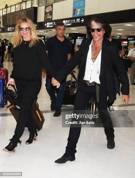 Joe Perry and Billie Paulette Montgomery are seen upon arrival at Narita International Airport on September 13, 2018 in Narita, Japan.