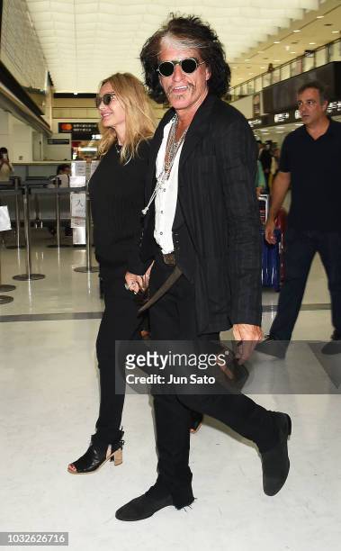 Joe Perry and Billie Paulette Montgomery are seen upon arrival at Narita International Airport on September 13, 2018 in Narita, Japan.