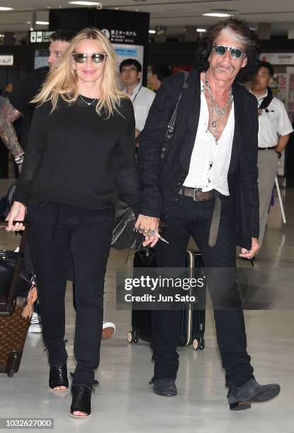 Joe Perry and Billie Paulette Montgomery are seen upon arrival at Narita International Airport on September 13, 2018 in Narita, Japan.