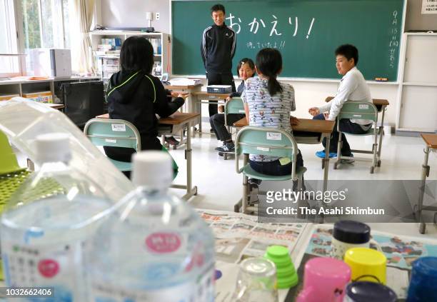 School pupils return to school a week after the magnitude 6.7 earthquake on September 13, 2018 in Abira, Hokkaido, Japan. Concerns are rising about...
