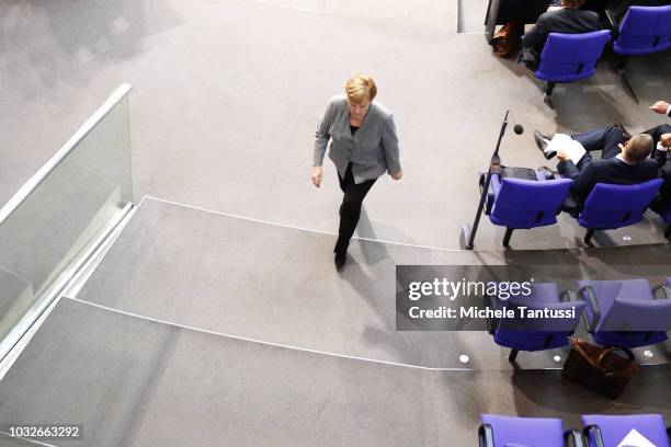 German Chancellor Angela Merkel leaves a session of the German Parliament or Bundestag on September 13, 2018 in Berlin, Germany. Relations within the...