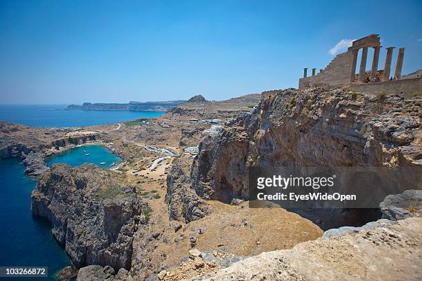 JUlLY 04: View from the Acropolis of Lindos down to the most beautiful bay, the old harbour Ajios Pavlos on July 04, 2010 in Lindos, Greece. The old...