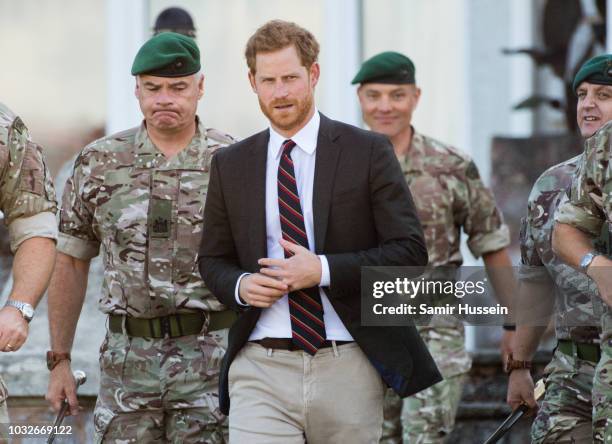 Prince Harry, Duke of Sussex visits the Royal Marines Commando Training Centre on September 13, 2018 in Lympstone, United Kingdom. The Duke arrived...