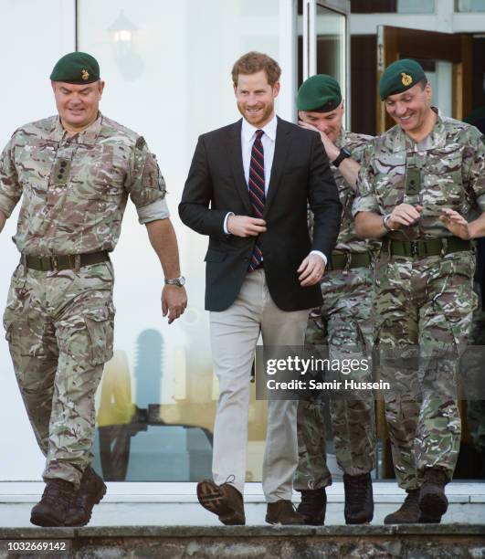 Prince Harry, Duke of Sussex visits the Royal Marines Commando Training Centre on September 13, 2018 in Lympstone, United Kingdom. The Duke arrived...