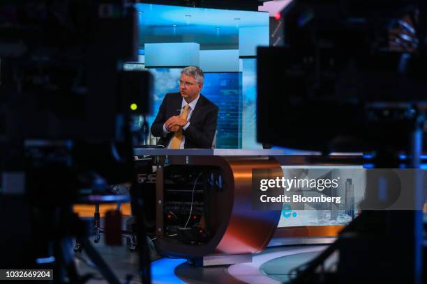 Severin Schwan, chief executive officer of Roche Holding AG, gestures while speaking during a Bloomberg Television interview in London, U.K., on...