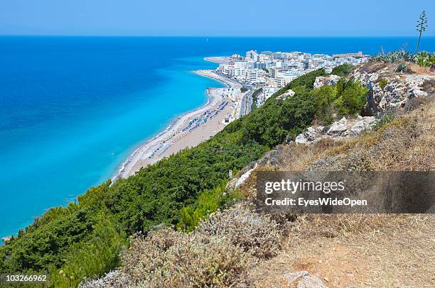 Aerial view from Monte Smith down to the coast, hotels and beaches of Ixia next to Rhodes city on June 06, 2010 in Rhodes, Greece . The old town of...