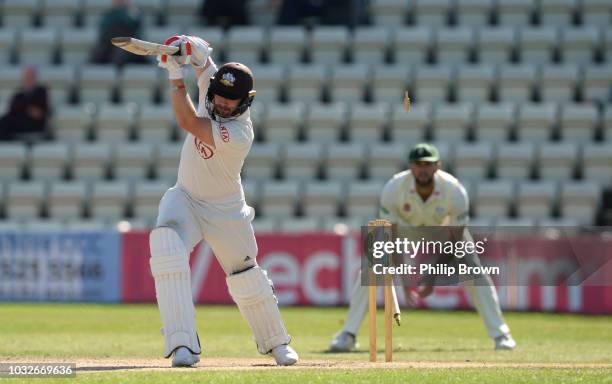 Mark Stoneman of Surrey is bowled by Wayne Parnell of Worcestershire during the Specsavers County Championship Division One match between...