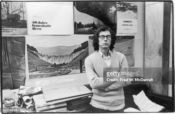 Portrait of Bulgarian-born artist Christo as he poses in his loft apartment , New York, New York, December 29, 1976. He is known for his...