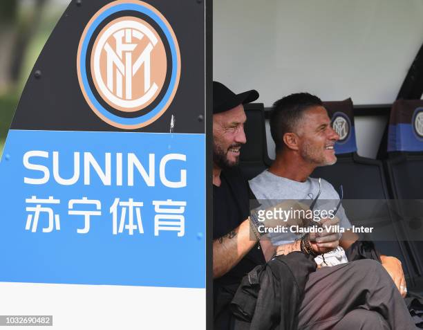 Walter Zenga and Benito Carbone watch the FC Internazionale training session at the club's training ground Suning Training Center in memory of Angelo...