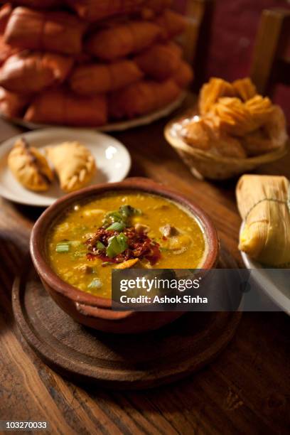 a locro (soup), tamales, empanadas and pastelitos - empanadas argentina stock pictures, royalty-free photos & images