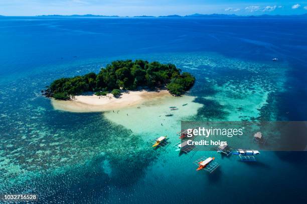 island of coron with a view of twin lagoon in palawan, philippines - philippines stock pictures, royalty-free photos & images