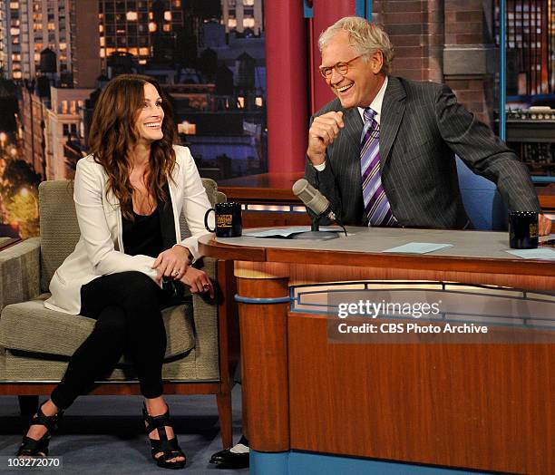 Julia Roberts and Late Show host David Letterman share a laugh during Wednesday's taping of the Late Show with David Letterman August 4, 2010 on the...