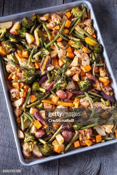 sheet pan chicken - baking sheet stock pictures, royalty-free photos & images