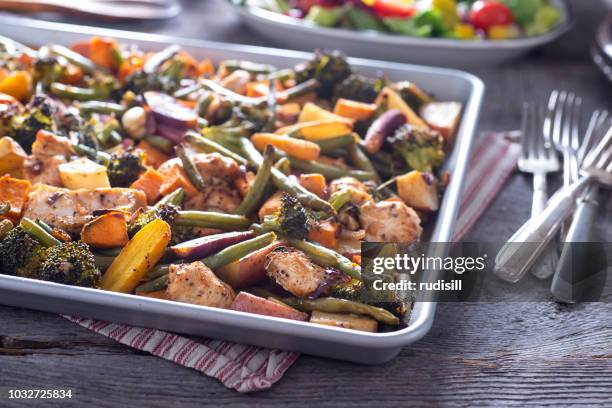 sheet pan chicken - baking sheet stock pictures, royalty-free photos & images