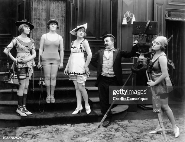 1910s COMIC PHOTOGRAPHER WITH MODELS IN SKIMPY BATHING COSTUMES SILENT MOVIE STILL