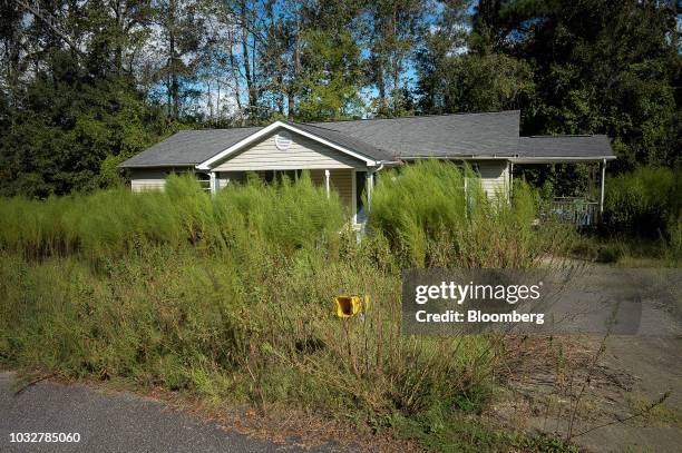 An abandoned home stands in Princeville, North Carolina, U.S., on Wednesday, Sept. 12, 2018. Princeville, which sits on low, swampy land, is so...