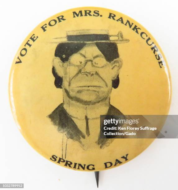 Black and cream anti-suffrage pin, with a caricature of the English, militant suffrage leader, Emmeline Pankhurst, and with the text "Vote For Mrs...