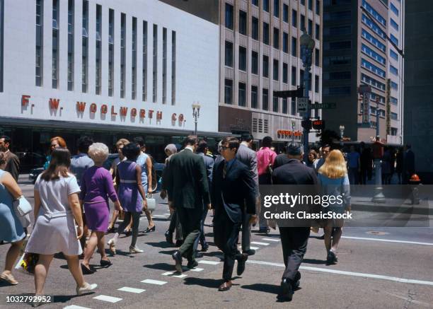 1970s CROWD CROSSING INTERSECTION MCKINNEY AND MAIN STREETS HOUSTON TEXAS USA