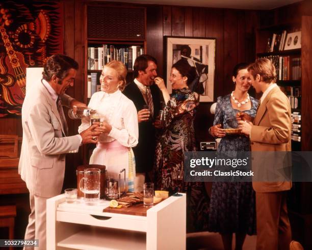 1970s THREE COUPLES TALKING EATING DRINKING ENJOYING A COCKTAIL PARTY