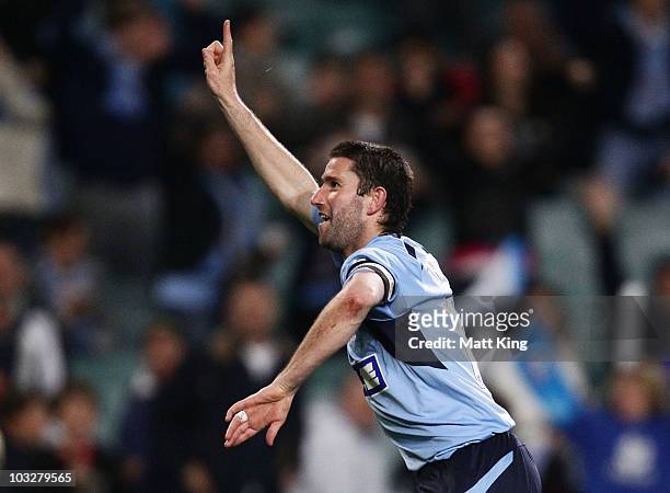 Sydney FC captain Terry McFlynn celebrates scoring a goal during the round one A-League match between Sydney FC and Melbourne Victory at the Sydney...