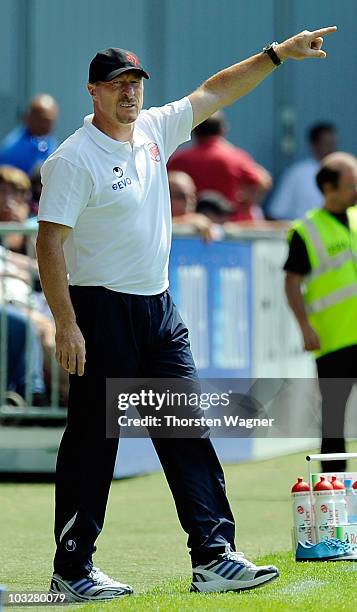 Head coach Wolfgang Wolf of Offenbach gestures during the Third League match between SV Wehen Wiesbaden and Kickers Offenbach at the Brita Arena on...