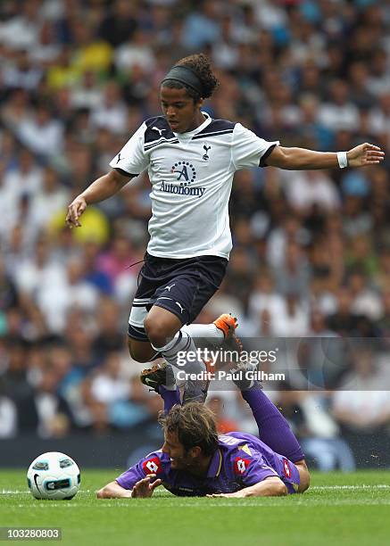Giovani Dos Santos of Tottenham Hotspur battles for the ball with Alberto Gilardino of Fiorentina during the pre-season friendly match between...
