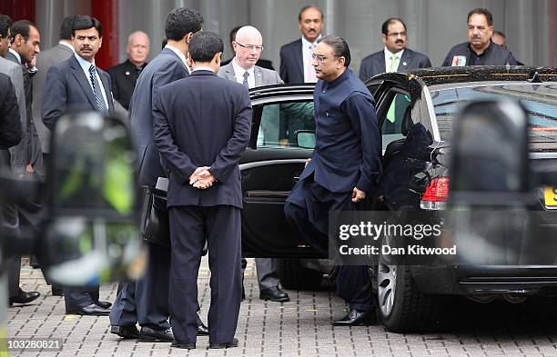 Pakistan's President Asif Ali Zardari arrives at the back entrance to Birmingham's International Convention Centre on August 7, 2010 in Birmingham,...