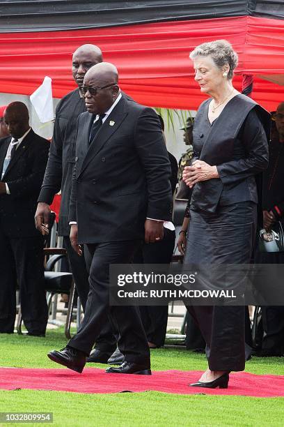 Nane Maria , widow of Kofi Annan, walks with Ghanaian President Nana Akufo-Addo as they attend the funeral ceremony of her husband at The Burma Camp...