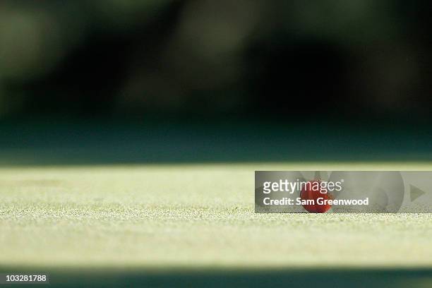 The orange golf ball of Katsumasa Miyamoto of Japan is seen during the third round of the World Golf Championships - Bridgestone Invitational on the...