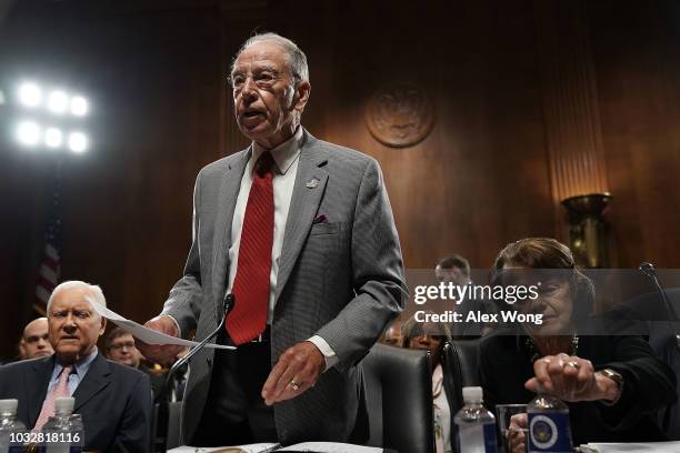 Committee Chairman U.S. Sen. Chuck Grassley speaks as ranking member Sen. Dianne Feinstein and Sen. Orrin Hatch listen during a markup hearing before...