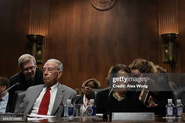 Committee Chairman U.S. Sen. Chuck Grassley and ranking member Sen. Dianne Feinstein listen to their aides during a markup hearing before the Senate...