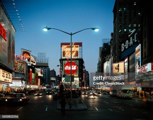 1960s 1966 TIMES SQUARE NIGHT BROADWAY AT 45th STREET LOOKING NORTH MANHATTAN NYC NEW YORK USA