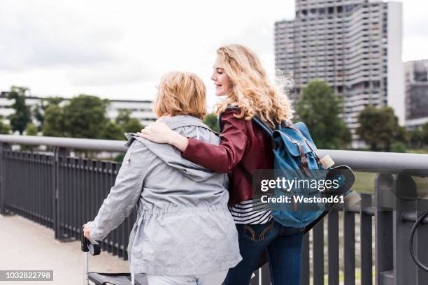 grandmother and granddaughter having fun together - oma rollator stockfoto's en -beelden