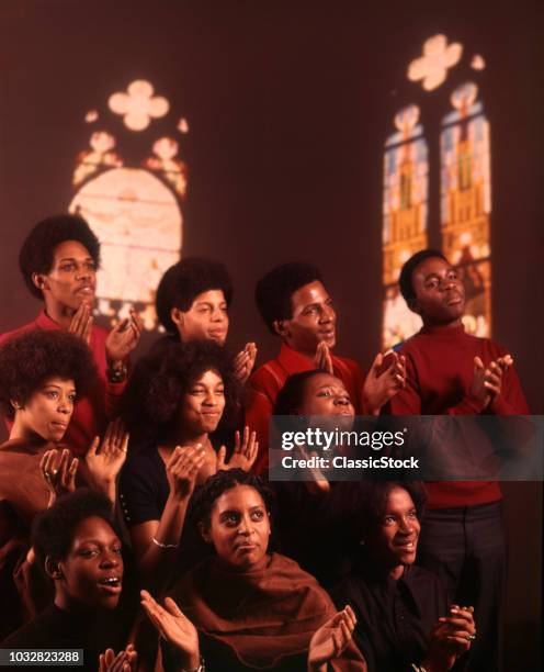 1980s 1970s AFRICAN AMERICAN GOSPEL CHOIR CHORUS SINGERS SINGING STAINED GLASS INTERIOR BACKGROUND