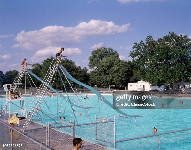 1960s 1970s COMMUNITY PUBLIC OR COUNTRY CLUB SWIMMING POOL WITH 2 WATER SLIDES LIFEGUARD RECREATION SUMMER FUN