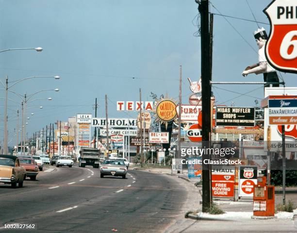 1970s SUBURBAN SHOPS FAST FOOD MOTELS GAS BUSY CLUTTER SIGNS AMERICANA ALONG CHEF MENTEUR HIGHWAY NEW ORLEANS LA USA