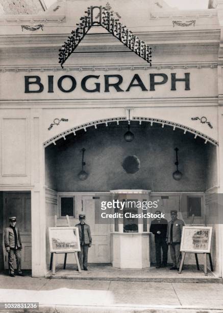 1890s FOUR MEN USHERS IN UNIFORM STANDING IN FRONT OF BIOGRAPH NICKELODEON ON SOUTH STREET IN PHILADELPHIA PA USA