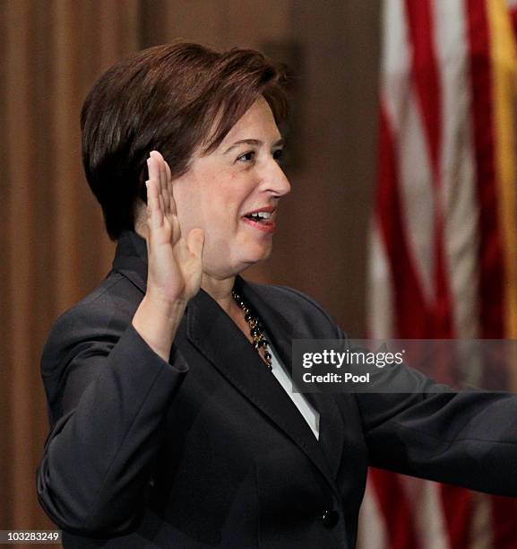 Elena Kagan is sworn in as the Supreme Court's newest member as Chief Justice John Roberts administers the judicial oath at the Supreme Court...