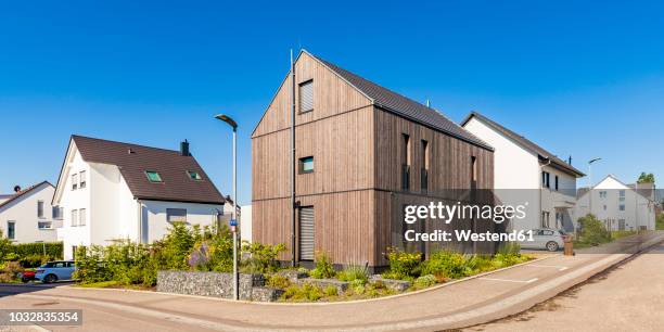 germany, baden-wuerttemberg, stuttgart, ostfildern, modern efficiency house, wooden facade, thermal insulation - energy efficient building stock pictures, royalty-free photos & images