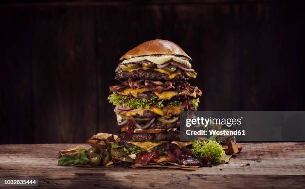 extra large cheese bacon burger - processed meat stock pictures, royalty-free photos & images