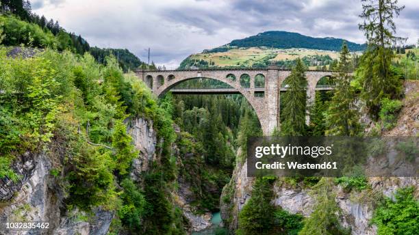 switzerland, graubuenden canton, solis viaduct - railway bridge stock-fotos und bilder