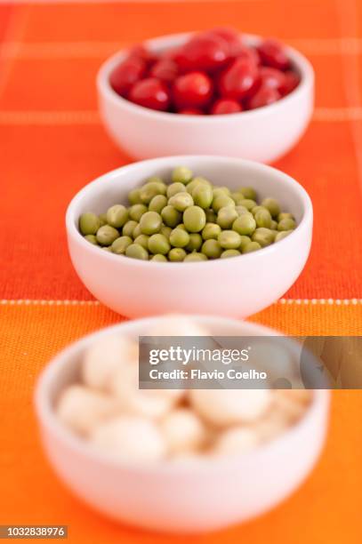 cherry tomatoes, green peas and edible mushrooms - salad bowl stock pictures, royalty-free photos & images