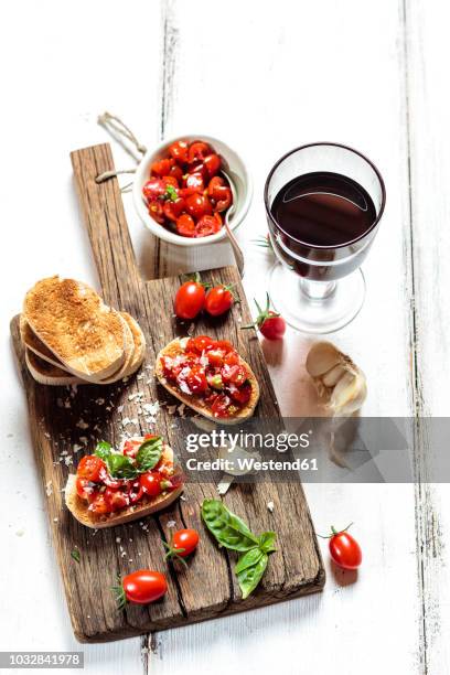 italian buschetta and red wine - bruschetta stock pictures, royalty-free photos & images