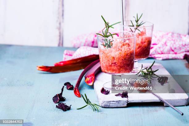 rhubarb-hibiscus granita with rosemary - sorbet stock pictures, royalty-free photos & images