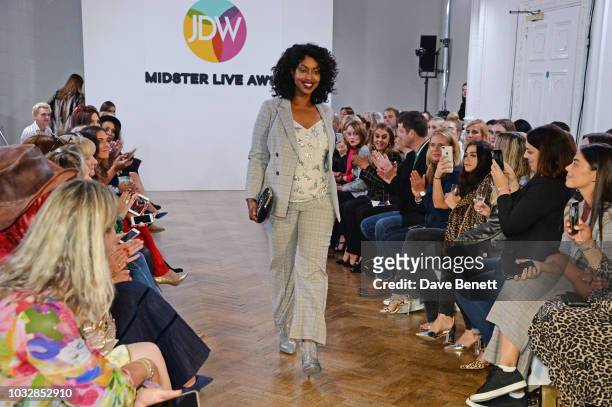Model walks the runway at the JDW Midster Live AW18 Catwalk Show and party presented by JD Williams during London Fashion Week September 2018 at One...