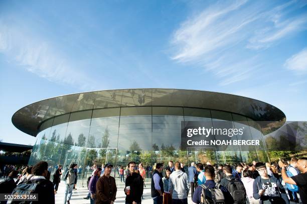 Attendees gather for a product launch event at Apple's Steve Jobs Theater on September 12 in Cupertino, California. - New iPhones set to be unveiled...