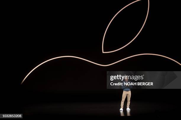 Apple CEO Tim Cook speaks during a product launch event on September 12 in Cupertino, California. - New iPhones set to be unveiled Wednesday offer...